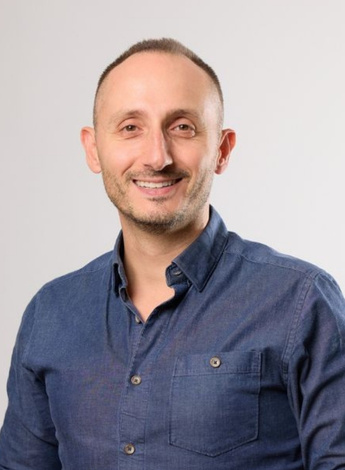 Mark Merolli is an associate professor of physiotherapy with an interest in AI. 